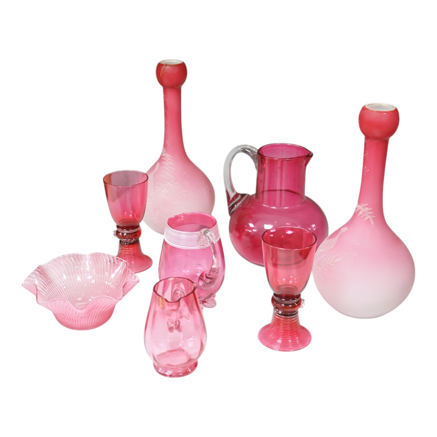 A pair of Victorian pink satin long necked vases, 25cm high, and five pieces of cranberry coloured glassware, (8). Condition - fair to good.